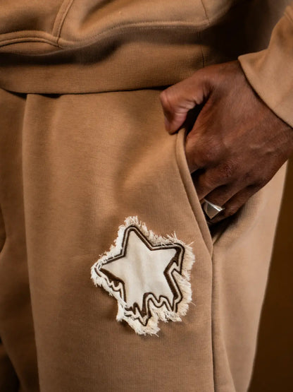 DISTRESSED APPLIQUE JOGGERS - PEANUT